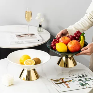 Luxury ceramic pedestal fruit plate with gold base for living room decor