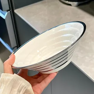 Elegant white ceramic ramen bowl with silver stripes, modern hat-shaped design for home