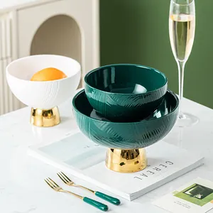 Nordic luxury ceramic pedestal fruit bowl set with elegant gold base and textured finish