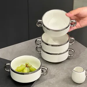 Modern white ceramic soup bowls with silver rim and double handles