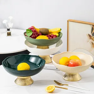 Coupes à fruits luxueuses en céramique avec socle doré pour décoration de salon