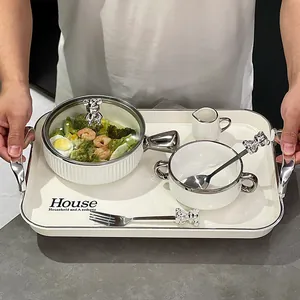 Élégant service de petit-déjeuner en céramique avec poignées ours et bords argentés