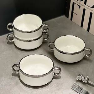 Modern white ceramic soup bowls with silver rim and double handles for home breakfast