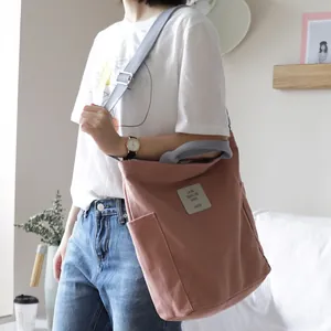 Stylish minimalist canvas shoulder bag with large capacity in dusty rose color for women