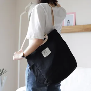 Korean style black canvas shoulder bag with large capacity for casual women's fashion