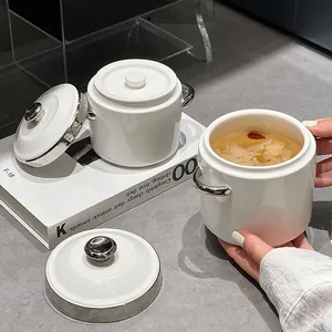 Minimalist white ceramic stew pot with lid and silver handles for bird's nest and soup