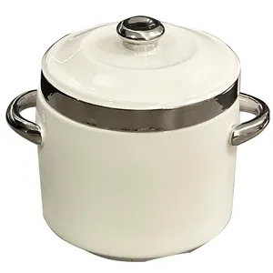 Modern minimalist white ceramic stew pot with silver chrome rim and lid handle