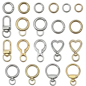 Colección de anillas de resorte y cierres de langosta de aleación de zinc para joyería.