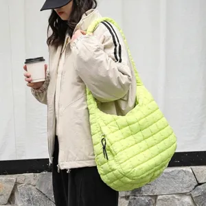 Trendy lime green quilted nylon shoulder bag with a padded grid design for casual wear