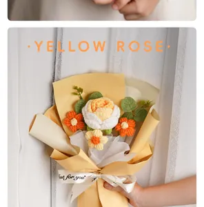 Close-up detail of handmade knitted yellow rose yarn flower bouquet for birthday gift