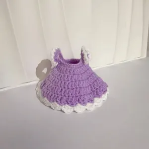Close-up detail of hand-crocheted purple and white princess dress for 20cm plush dolls