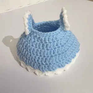 Detailed view of handmade blue and white crochet princess dress for 20cm cotton dolls