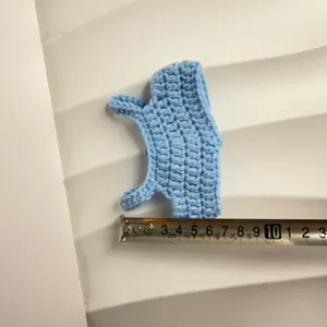Handmade blue crocheted doll vest for 17cm plush accessories, size measurement view.