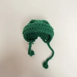 Handmade green crochet mini hat with ties for doll and puppet dress up accessories