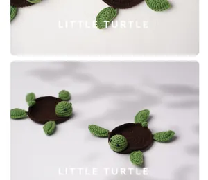 Close-up of handmade green and brown crochet turtle coasters for cute table decor