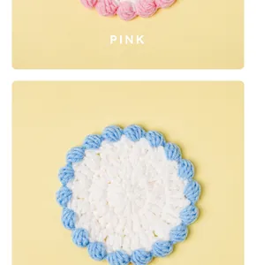 Close-up showing the blue and white handmade wool crochet macaron color coaster