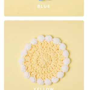 Detail view of yellow crochet coaster with white pom-pom border