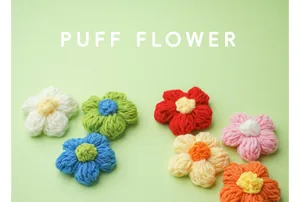 Detailansicht bunter handgefertigter 6 cm großer gehäkelter Puffblumen-Accessoires