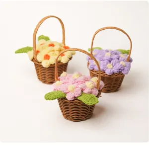 Mini handmade crochet puff flower baskets in woven handles for home decor or gifting