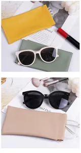 Primer plano de fundas portátiles de cuero para gafas en varios colores