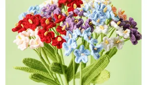 Macro detail showing hand-knitted colorful crochet forget-me-not bouquet texture