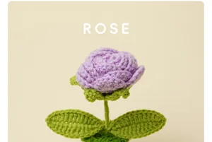 Handmade crochet purple rose flower detail, exquisite knitted floral decor for interior home gift.