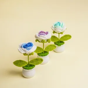 Handmade crochet rose potted plant for home decoration and thoughtful graduation gifts.