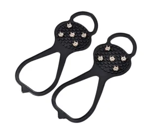 Durable 5-teeth ice cleats for snow and ice, stretchable black anti-slip shoe covers.