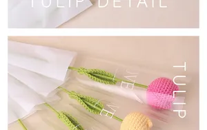 Macro detail of handmade crochet tulips with elegant decorative gift packaging