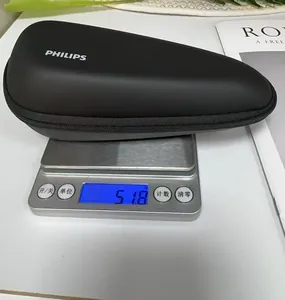 Detailed view showing the weight of the portable EVA razor storage case on a scale