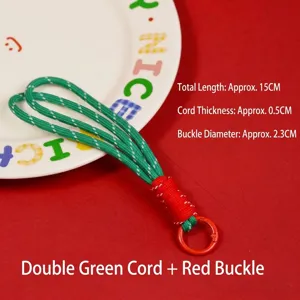 Handmade green and red braided lanyard charm with circular red clasp for phone or bag