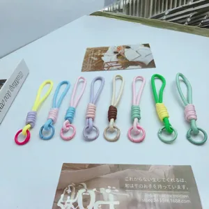 Colorful braided phone lanyards and keychains with spring O-rings in vibrant tones.