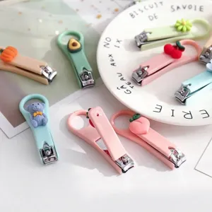 Cute cartoon nail clippers in pastel colors with creative fruit and animal charms