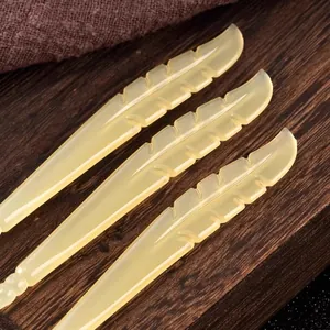 Soft resin feather-shaped ear picks for gentle ear wax removal and cleaning tool