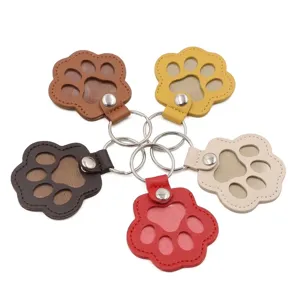 Colección de llaveros conmemorativos en forma de pata de cuero PU para pelo de mascotas