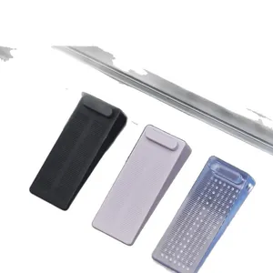 Stackable non-slip wedge door stoppers in black, purple, and blue for home safety