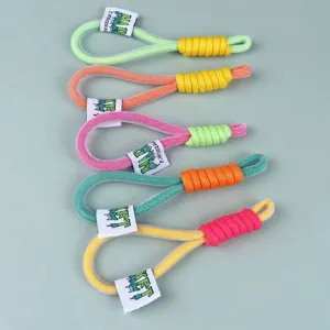 Detailed view of five colorful braided phone wrist lanyards with woven white labels