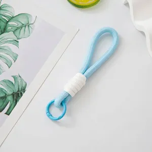Minimalist handmade blue woven rope keychain with white knotted accent and circular clip