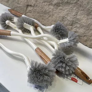 Long-handle L-shaped toilet brush with grey bristles and wood-textured grip