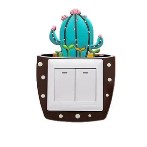 Glow-in-the-dark silicone light switch cover with cute cartoon cactus design for wall decoration.