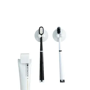 Minimalist white suction cup toothbrush holders for organized bathroom wall storage