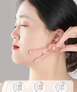 Masajeador facial rosa con forma de conejo para levantamiento y firmeza de la mandíbula