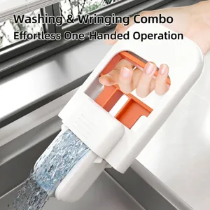 Close-up of handheld mini squeeze mop showing integrated wash and drain mechanism