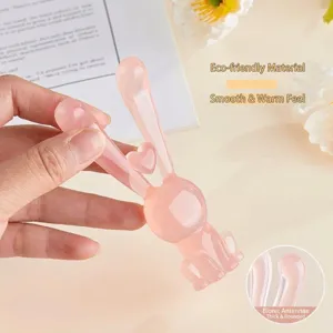 Masajeador facial rosa con forma de conejo para estiramiento y relax, herramienta Guasha
