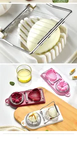 Detailed view of dual-head egg slicer showing slicing and wedging functions for boiled eggs