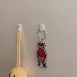 Minimalist white adhesive wall hooks for keys and small items in Japanese style