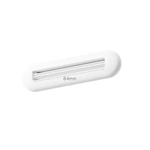 White manual toothpaste squeezer tool with 64mm wide slot for various tubes and creams