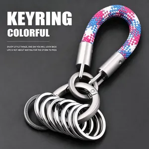 Detailed macro view of a colorful braided rope keyring with multiple stainless steel rings