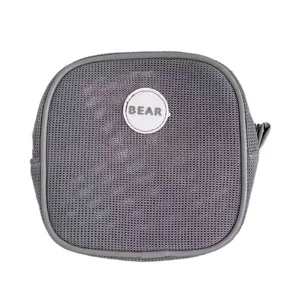 Detailed macro view of square grey mesh travel cosmetic pouch featuring a white Bear logo patch