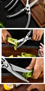 Close-up of stainless steel poultry shears with locking mechanism cutting fresh celery